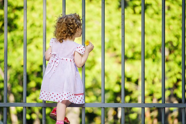 girl at fence
