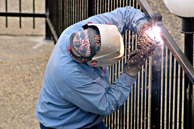 a man installing fences