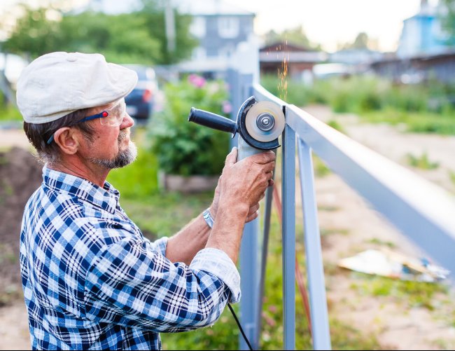 a man installing fences