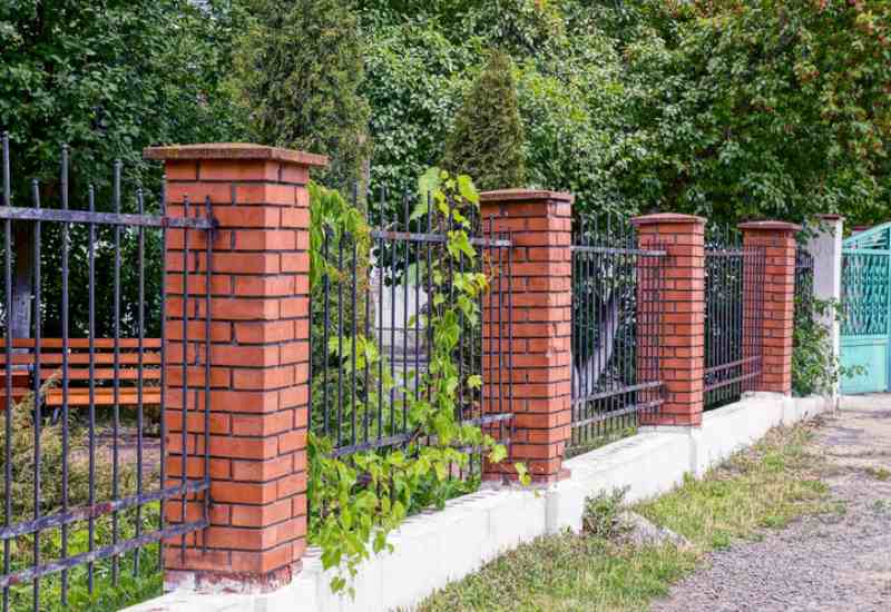 A-1 Fence Inc. has installed an iron fence combined with brick walls in San Jose, CA